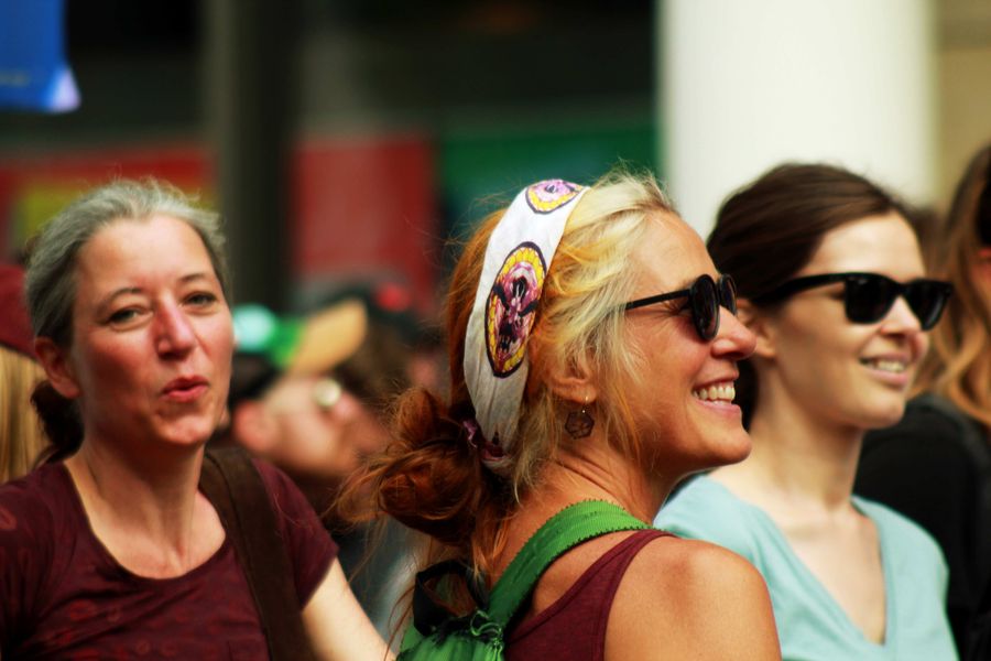 Smiling Women in a Crowd